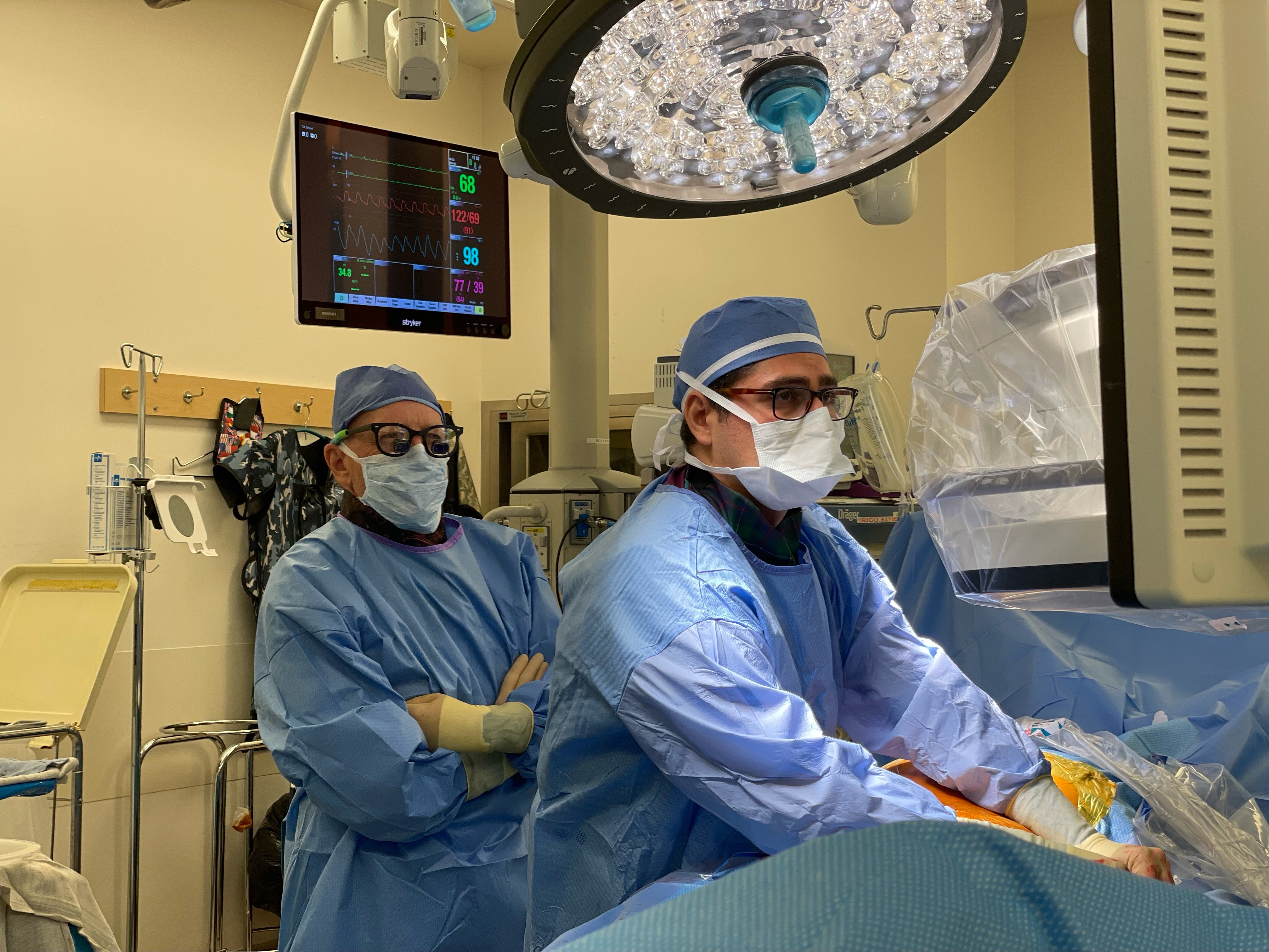 Dr. Ornekian and a colleague in the operating room